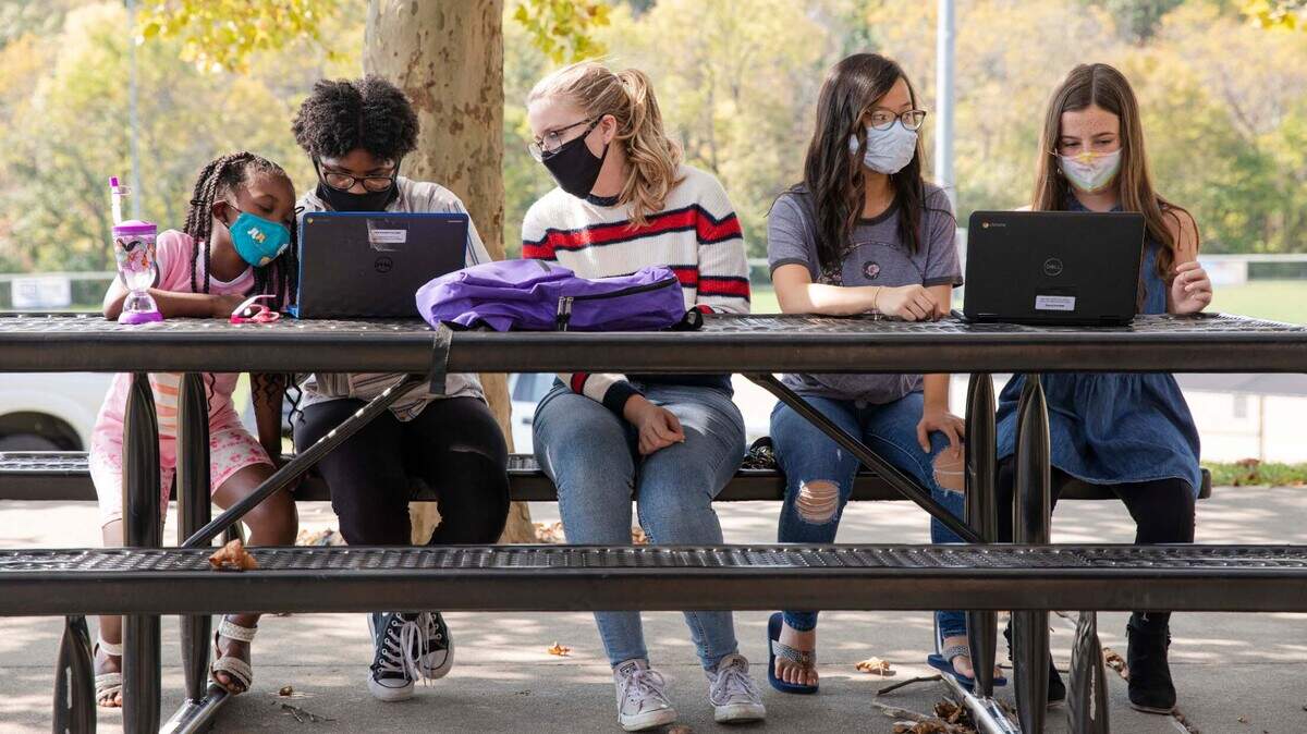 Brooklynn Howery, Rori Howery, Bethany Danley, Brianna Nguyen and Ava Twogood work together as part of the Lee’s Summit Girls Who Code club,