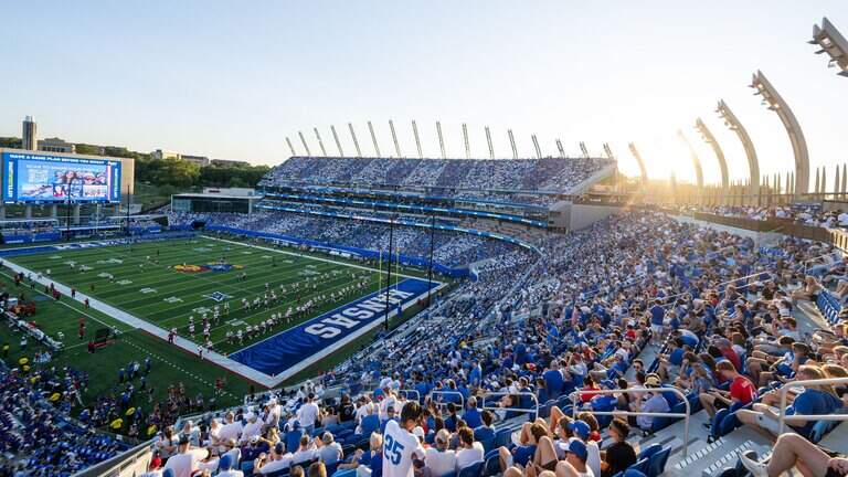 Jayhawks fans pack freshly renovated Memorial Stadium for home opener. See photos