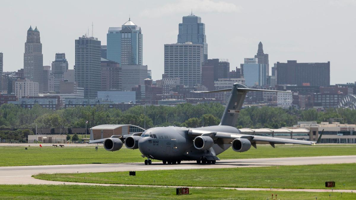 A Tennessee Air National Guard Boeing C-17A Globemaster III taxis down a runway after landing at the Charles B. Wheeler Downtown Airport on Thursday, Aug. 17, 2023, in Kansas City.