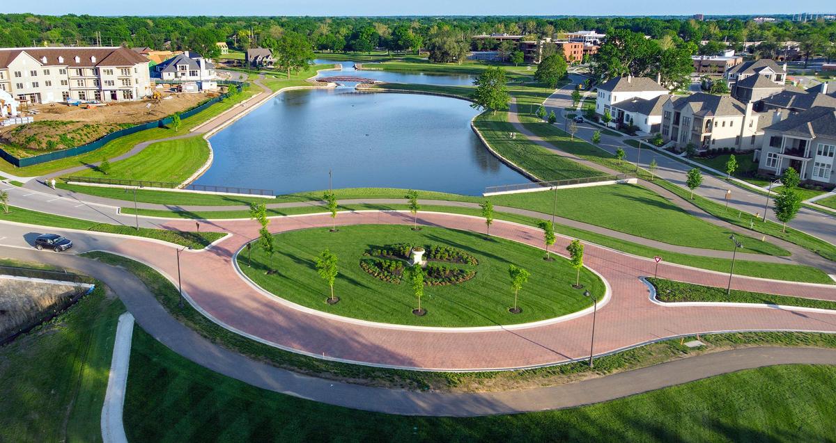 The new Meadowbrook Park is framed by residential development, including single family homes, twin villas, apartments and a senior living facility.