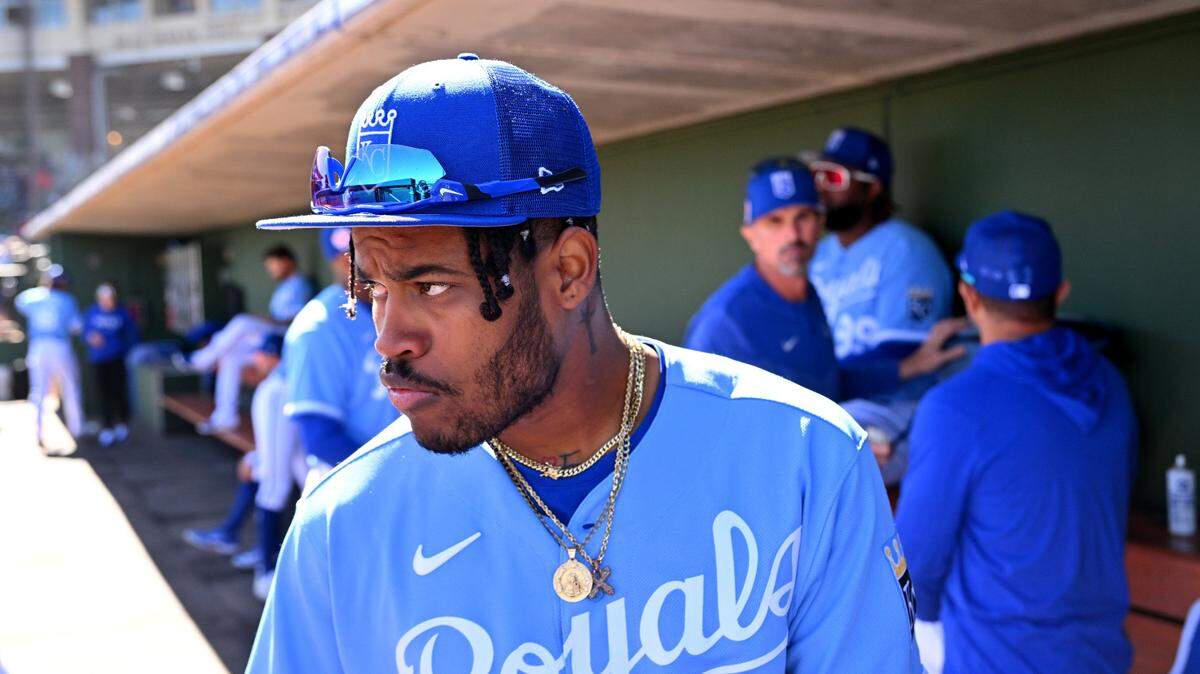 Feb 24, 2023; Surprise, Arizona, USA; Kansas City Royals shortstop Maikel Garcia (11) gets ready in the dugout prior to the spring training game against the Texas Rangers in Surprise, AZ. Mandatory Credit: Jayne Kamin-Oncea-USA TODAY Sports