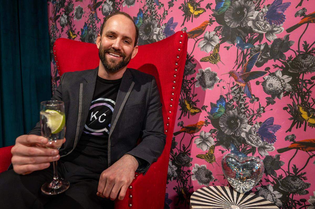 Lance Pierce, co-owner of Q Kansas City, poses for a portrait at the Q&A lounge on Friday. He says the new business is meant to be “a cathartic space created by queer artists, queer designers, queer creatives.”