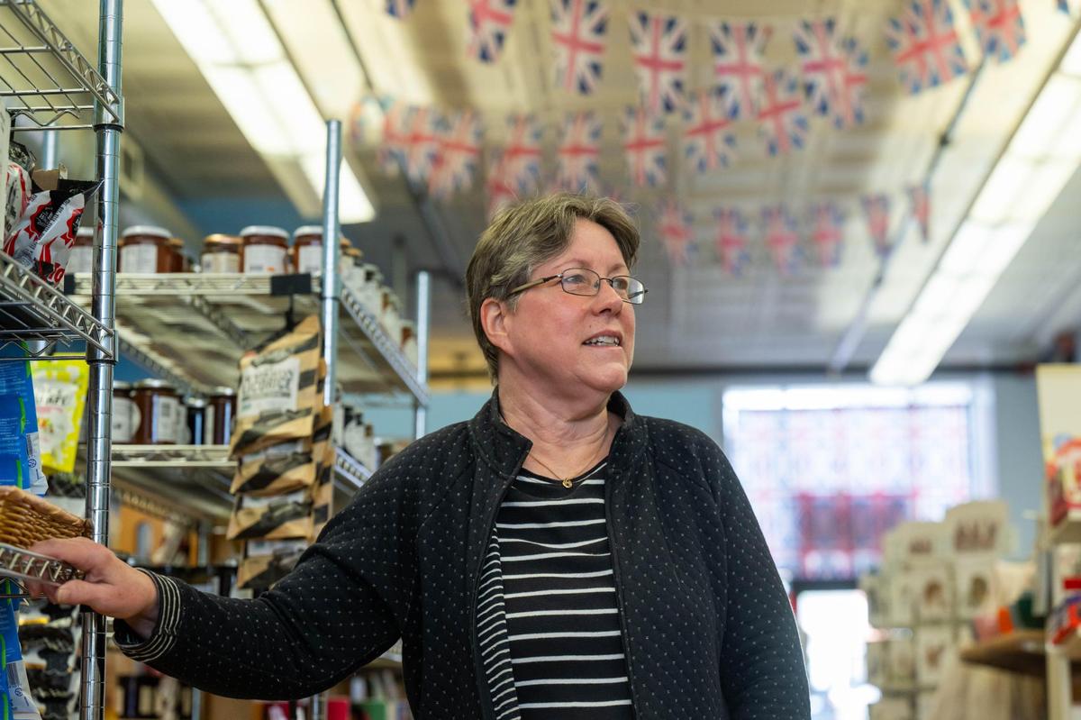 Sally Helm, owner of Brits, a shop that sells British imported items, in Lawrence.