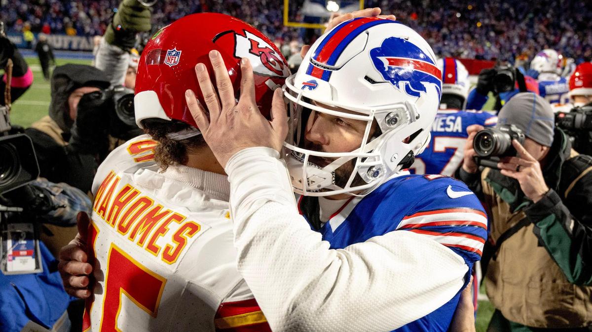 Kansas City Chiefs quarterback Patrick Mahomes (15) and Buffalo Bills quarterback Josh Allen (17) meet at midfield after the Chiefs defeated the Buffalo Bills 27-24 during an AFC Divisional Round playoff game at Highmark Stadium on Sunday, Jan. 21, 2024, in Orchard Park, New York.
