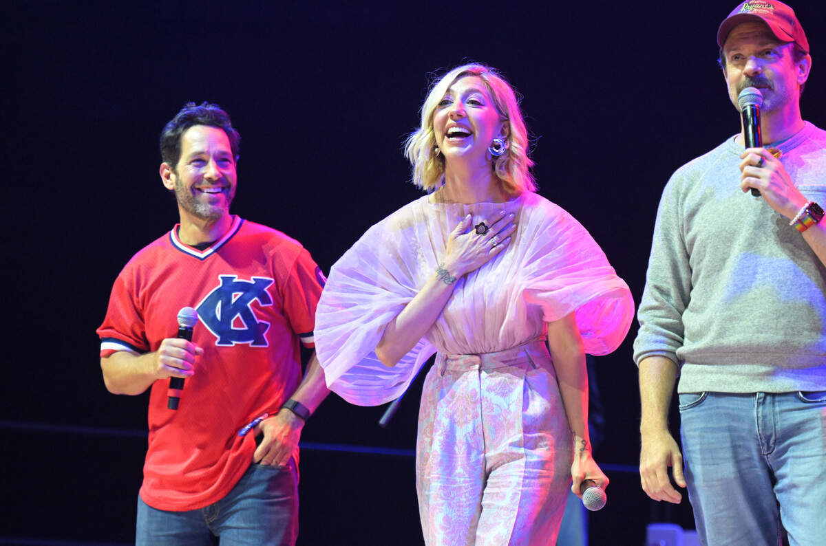 Co-hosts Paul Rudd, left, Heidi Gardner and Jason Sudeikis appear on stage Saturday, May 31, 2025, during the Big Slick Party and Show at T-Mobile Center in Kansas City.