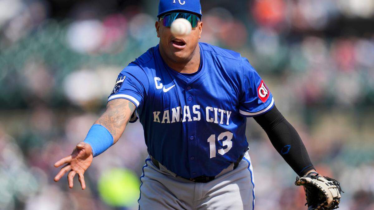 Kansas City’s Salvador Perez had his eye on the ball during a play at first base in the Royals’ Sunday, April 20, 2025 Major League Baseball game against the Tigers at Comerica Park in Detroit.