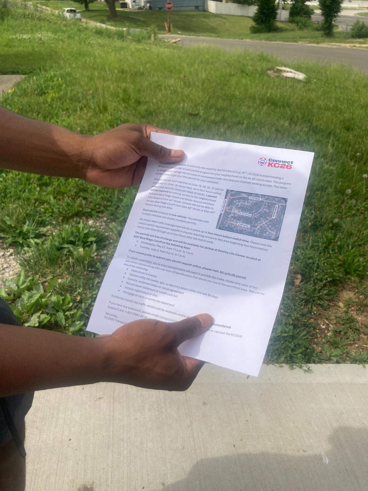 Resident Des Beard holds the letter he received from KC2026 telling him how to obtain a car permit that will allow him to access his neighborhood on match days during the 2026 FIFA World Cup.