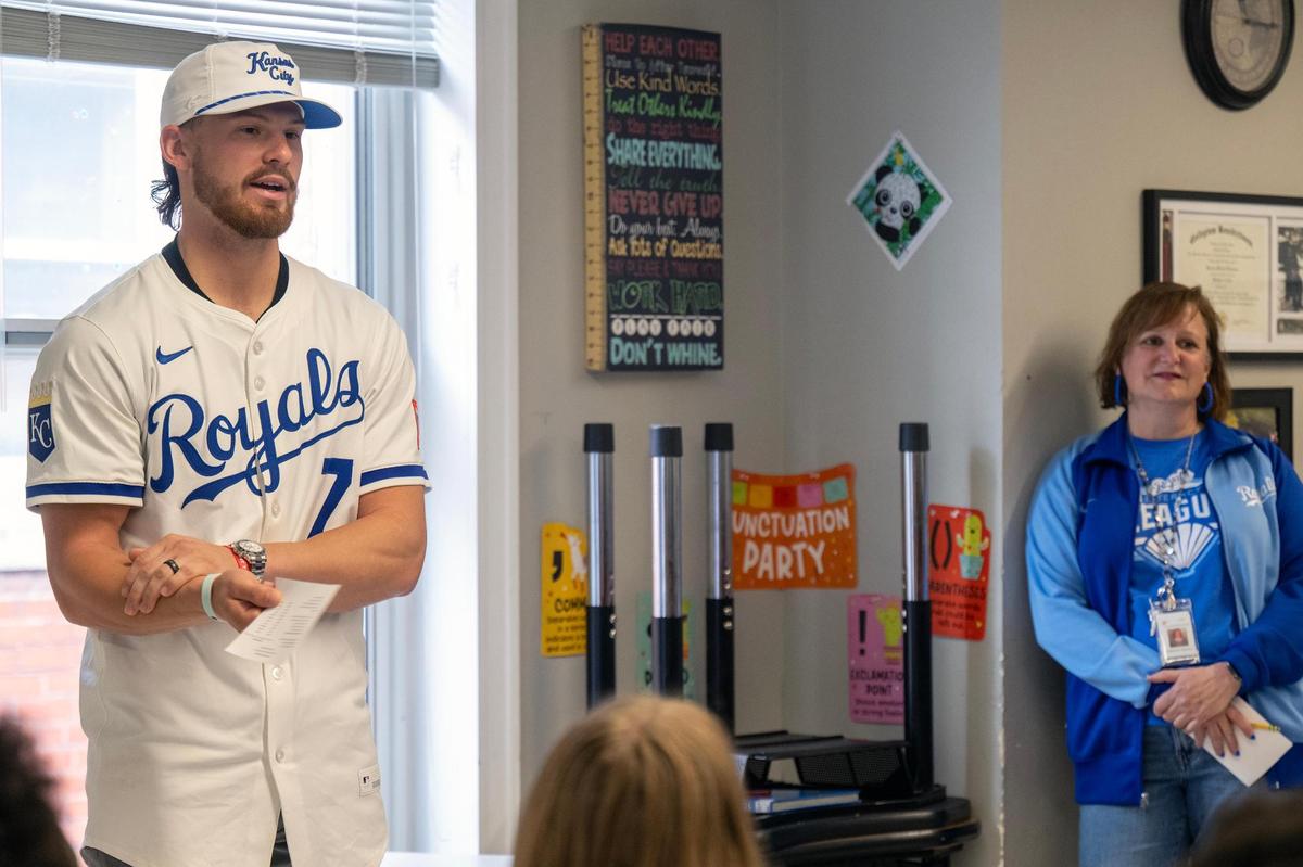 Kansas City Royals shortstop Bobby Witt Jr. answered questions from fifth-grade students during a visit to Crossroads Academy as part of Royals Literacy League’s efforts to encourage reading among Kansas City elementary students on Wednesday, May 7, 2025 in Kansas City. Shannon Reasby, right, instructional specialist, looked on during the event.