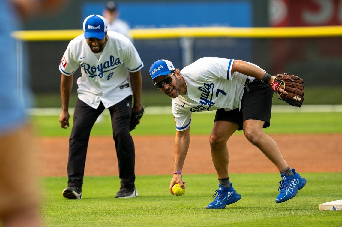 Paul Rudd fumbles the ball during the Big Slick Celebrity Softball game on Friday, May 30, 2025, at Kauffman Stadium in Kansas City.