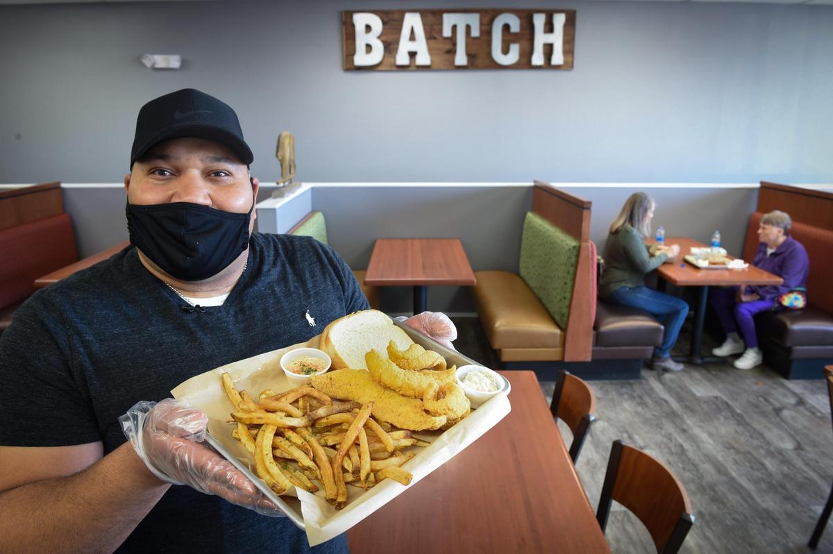 “I’m just trying to hang on,” said Lee Redwood, owner of Batch Country Kitchen & ‘Que, 6253 N. Oak Trafficway. Redwood, who displayed his Fried Fish Po’ Boy sandwich, opened during the pandemic and is hoping his restaurant will survive.