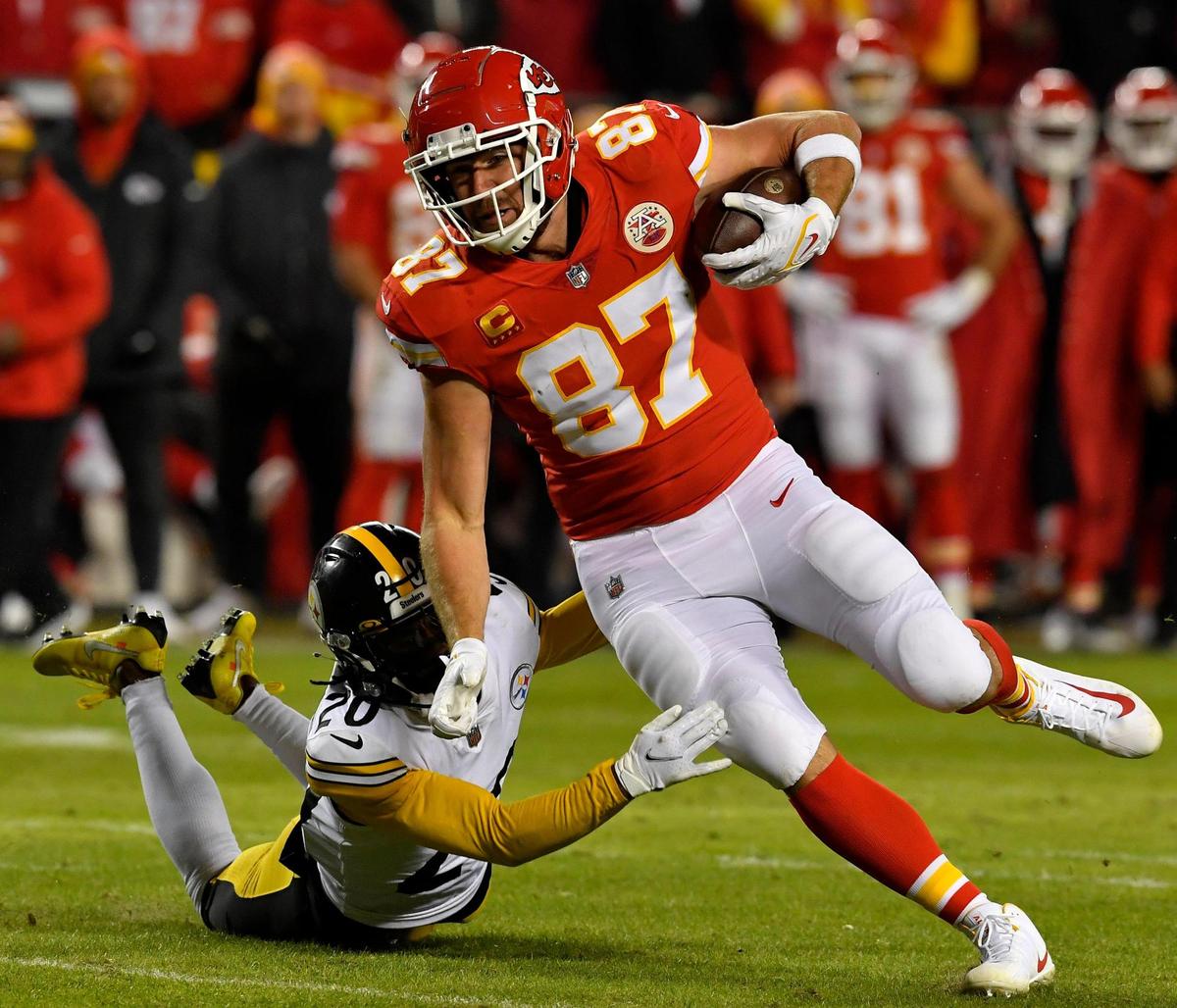 The Chiefs Travis Kelce runs for a big gain during the first half of Sunday night’s AFC Wild Card playoff game at Arrowhead Stadium.