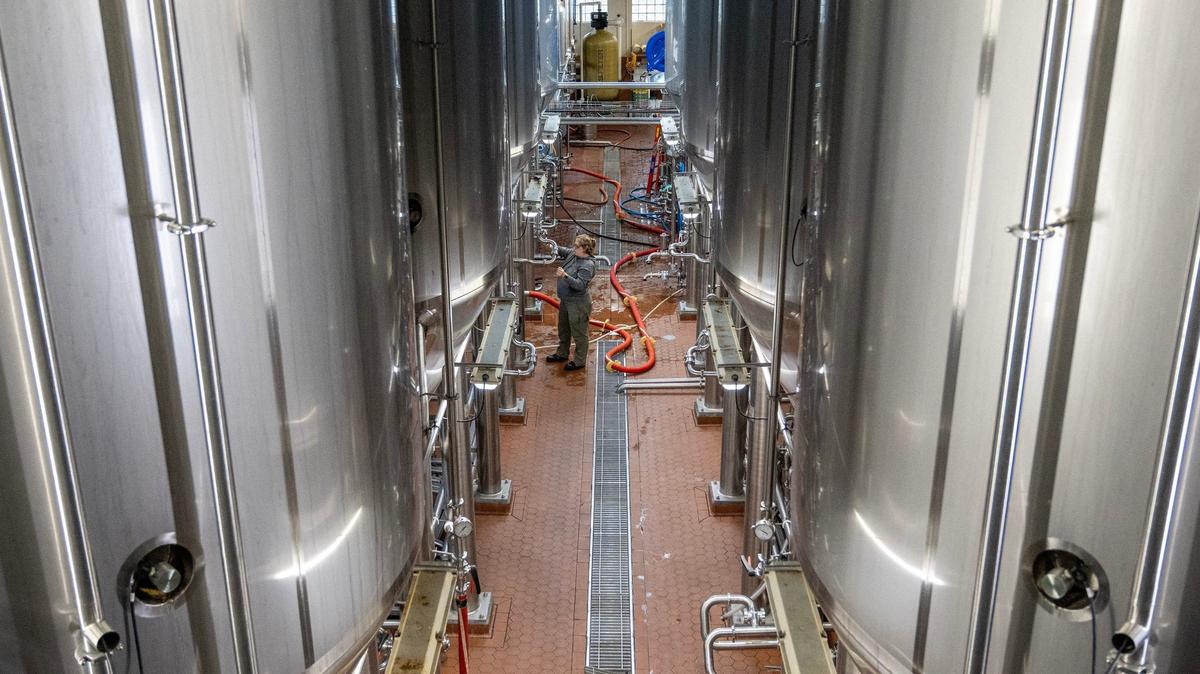 Rows of giant tanks tower over workers at Kansas City’s Boulevard Brewing Co., which sells beer in almost every state, as well as in other countries.