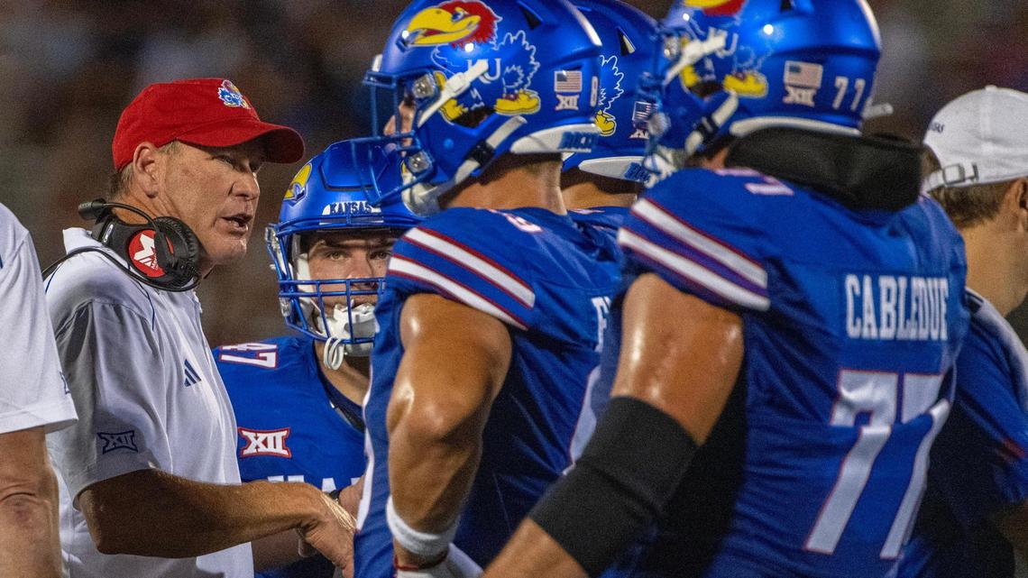 Kansas Jayhawks head coach Lance Leipold speaks to players during the season opener against the Missouri State Bears at David Booth Kansas Memorial Stadium on Friday, Sept. 1, 2023, in Lawrence, Kan.