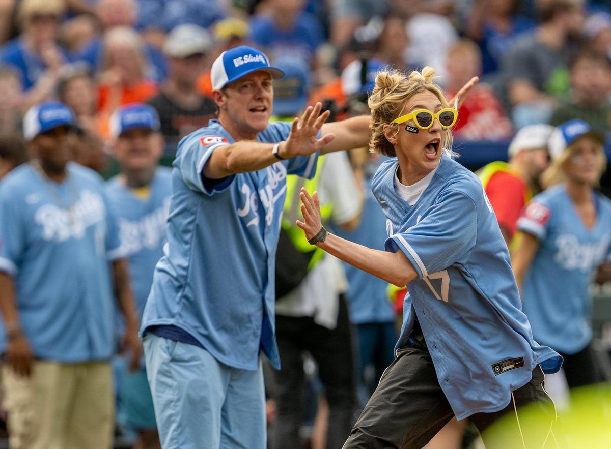 Heidi Gardner, host, runs for home plate during the Big Slick Celebrity Softball game on Friday, May 30, 2025, at Kauffman Stadium in Kansas City.