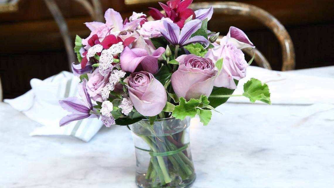Flowers in a vase on the porch.