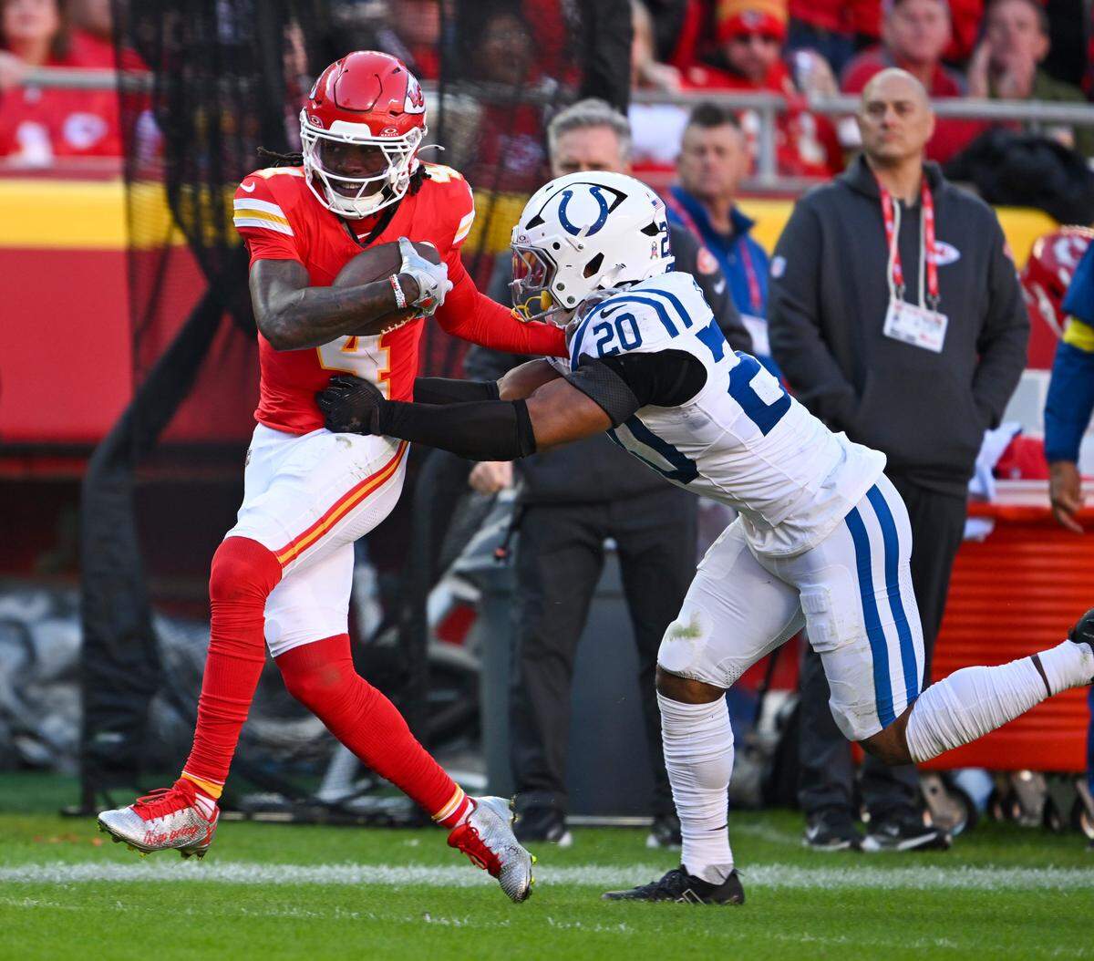 Chiefs wide receiver Rashee Rice, left, attempts to evade Indianapolis Colts safety Nick Cross during an NFL Week 12 game at GEHA Field at Arrowhead Stadium in Kansas City on Sunday, Nov. 23, 2025.