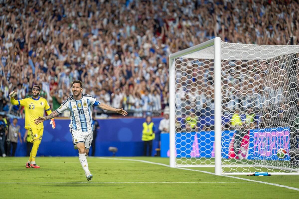 Argentina forward Lionel Messi (10) celebrates after scoring his second goal in the second half of a FIFA World Cup group-stage soccer match against Algeria at Kansas City (Arrowhead) Stadium on Tuesday, June 16, 2026, in Kansas City.