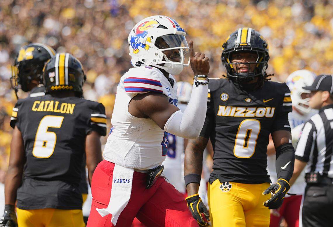 Kansas Jayhawks quarterback Jalon Daniels (6) celebrates after scoring a touchdown during the first half against the Missouri Tigers at Faurot Field at Memorial Stadium on Sept. 6, 2025.