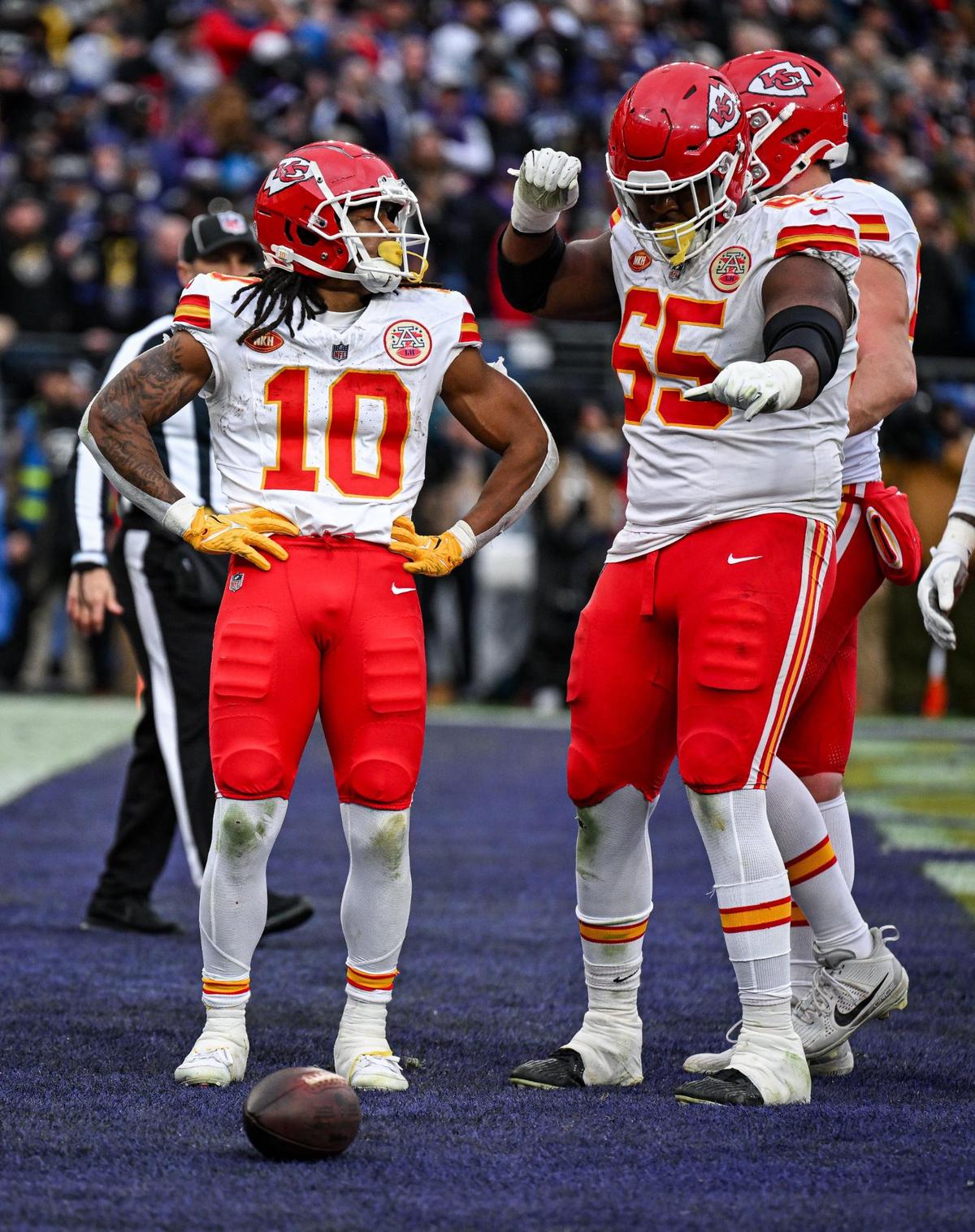 Kansas City Chiefs guard Trey Smith (65) shows his dance moves to running back Isiah Pacheco (10) after Pacheco ran in for a touchdown in the second quarter against the Baltimore Ravens Sunday, Jan. 28, 2024, during the AFC Championship Game in Baltimore.