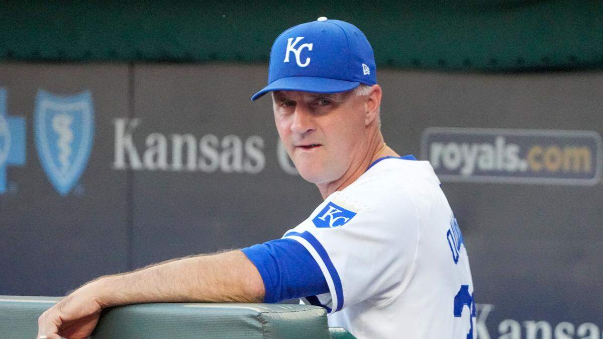 Kansas City Royals manager Matt Quatraro watches preparations for Wednesday evening’s game against the Cleveland Guardians from the dugout at Kauffman Stadium.