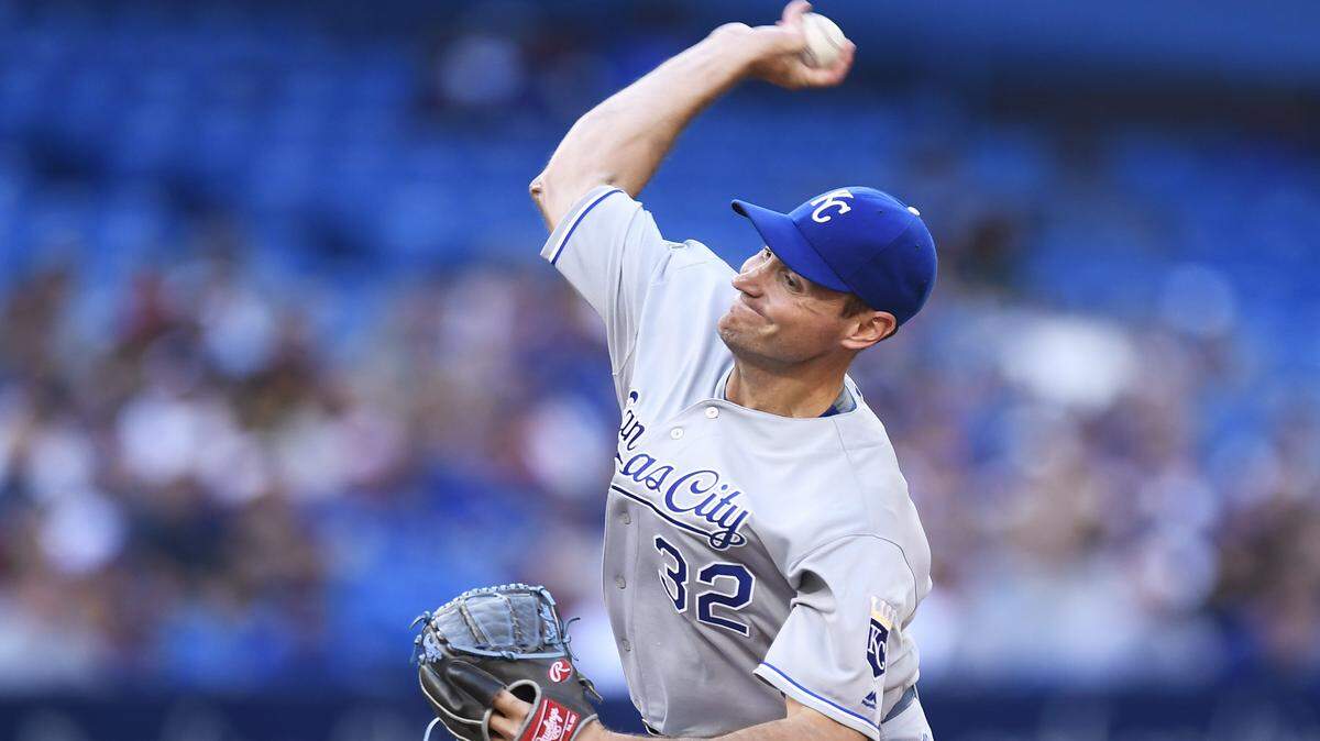 Kansas City Royals' Chris Young pitches against the Toronto Blue Jays during the first inning of a baseball game in Toronto on Tuesday, July 5, 2016. 