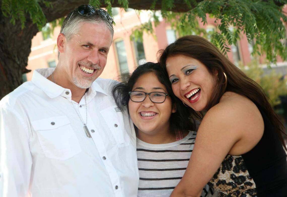 Leticia Stegall, right, poses with her husband, Steve Stegall, and her daughter, Jennifer Uscanga.