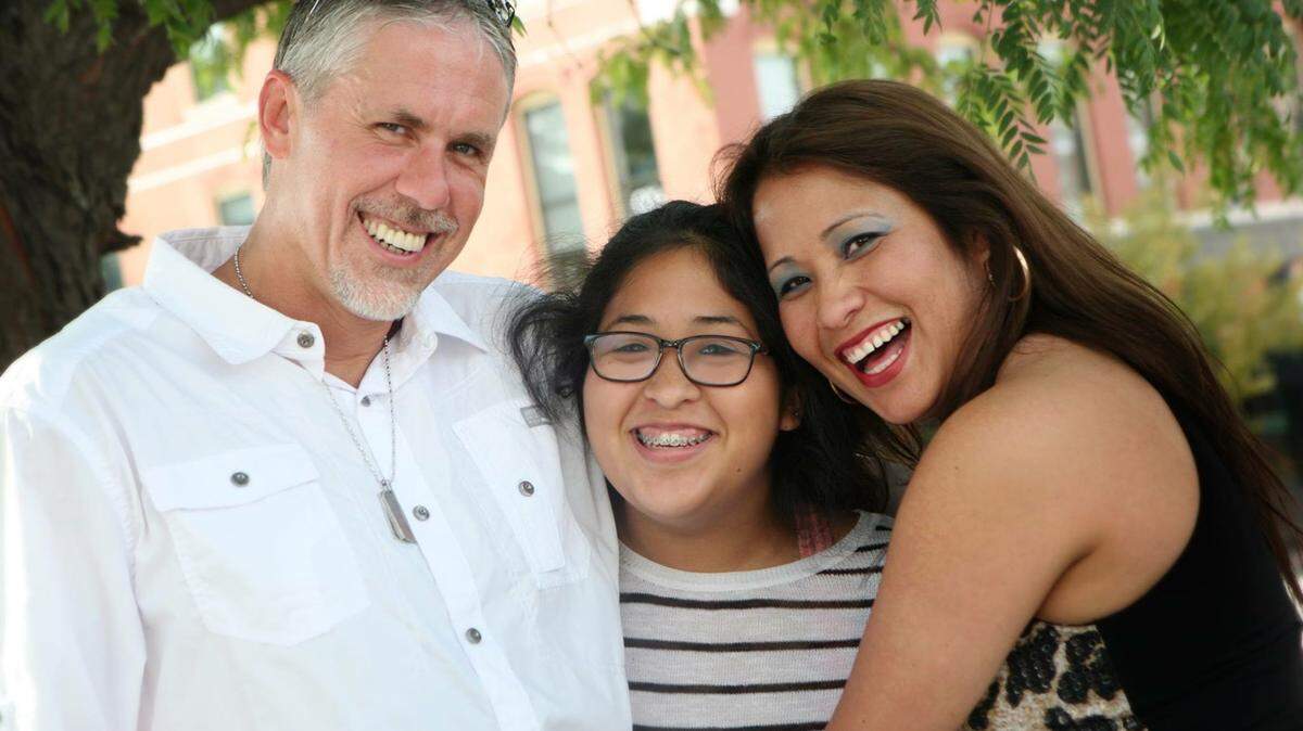 Leticia Stegall, right, poses with her husband, Steve Stegall, and her daughter, Jennifer Uscanga.