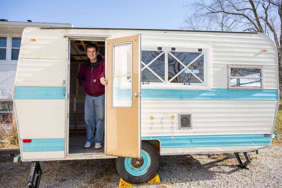 Seth McGrew, a 24-year-old UMKC student, poses inside his soon to be coffee shop on wheels, on Wednesday, Dec. 10, 2025, in Kansas City.