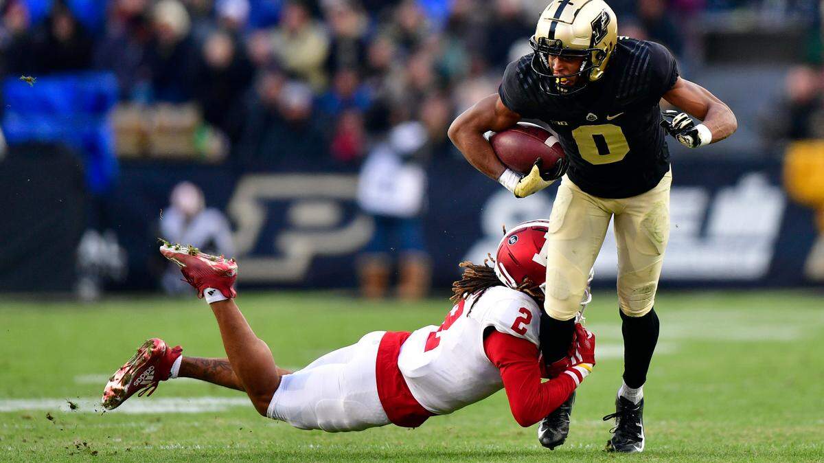 Purdue Boilermakers wide receiver Milton Wright (0) is tackled by Indiana Hoosiers defensive back Reese Taylor (2)during the second quarter at Ross-Ade Stadium.