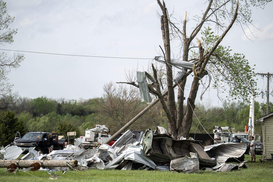 Storm debris littered Hillsdale, Kansas, on Tuesday, April 14, 2026, following an EF-2 tornado that struck Miami County on Monday night, leaving a trail of visible destruction.