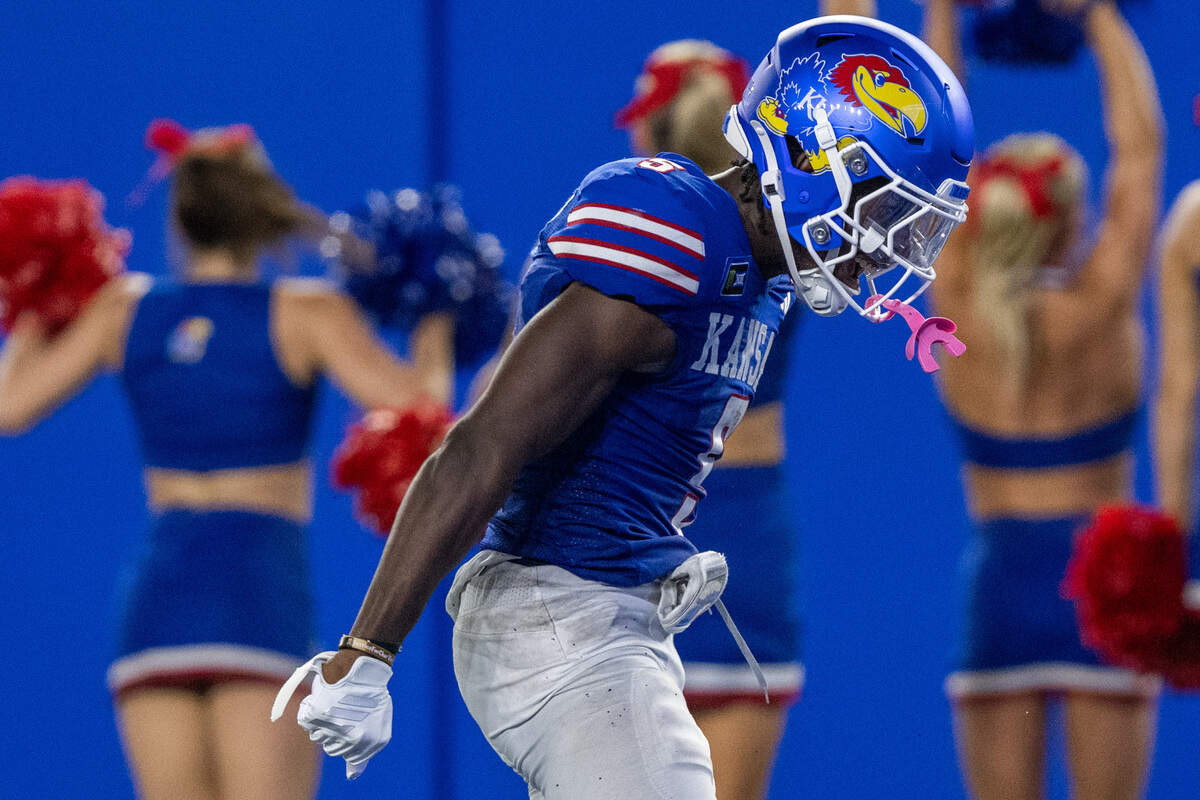 Kansas Jayhawks wide receiver Nik McMillan (5) celebrates after a big catch in the second half of the Jayhawks game vs. Long Island University Sharks at David Booth Memorial Stadium on Friday, September 4, 2026, in Lawrence.