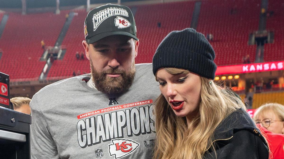 Kansas City Chiefs tight end Travis Kelce (87), left, and Taylor Swift walk off the field after the trophy ceremony following the Chiefs’ 32-29 victory over the Buffalo Bills in the AFC Championship Game on Sunday, Jan. 26, 2025, at GEHA Field at Arrowhead Stadium.