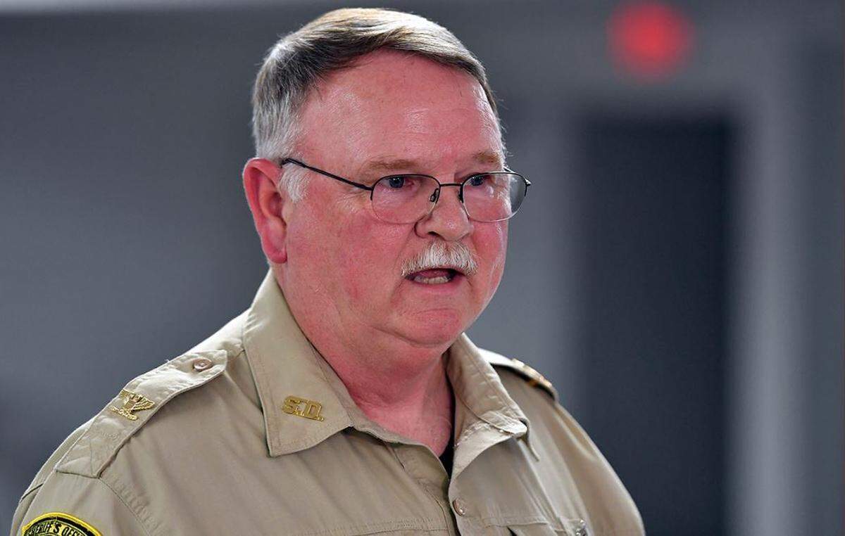 Caldwell County Sheriff Mitch Allen announces that a Kansas City man has been charged with several crimes in connection with a string of arson fires, including one that killed an elderly grandmother. Allen spoke about the charges at a news conference Monday.