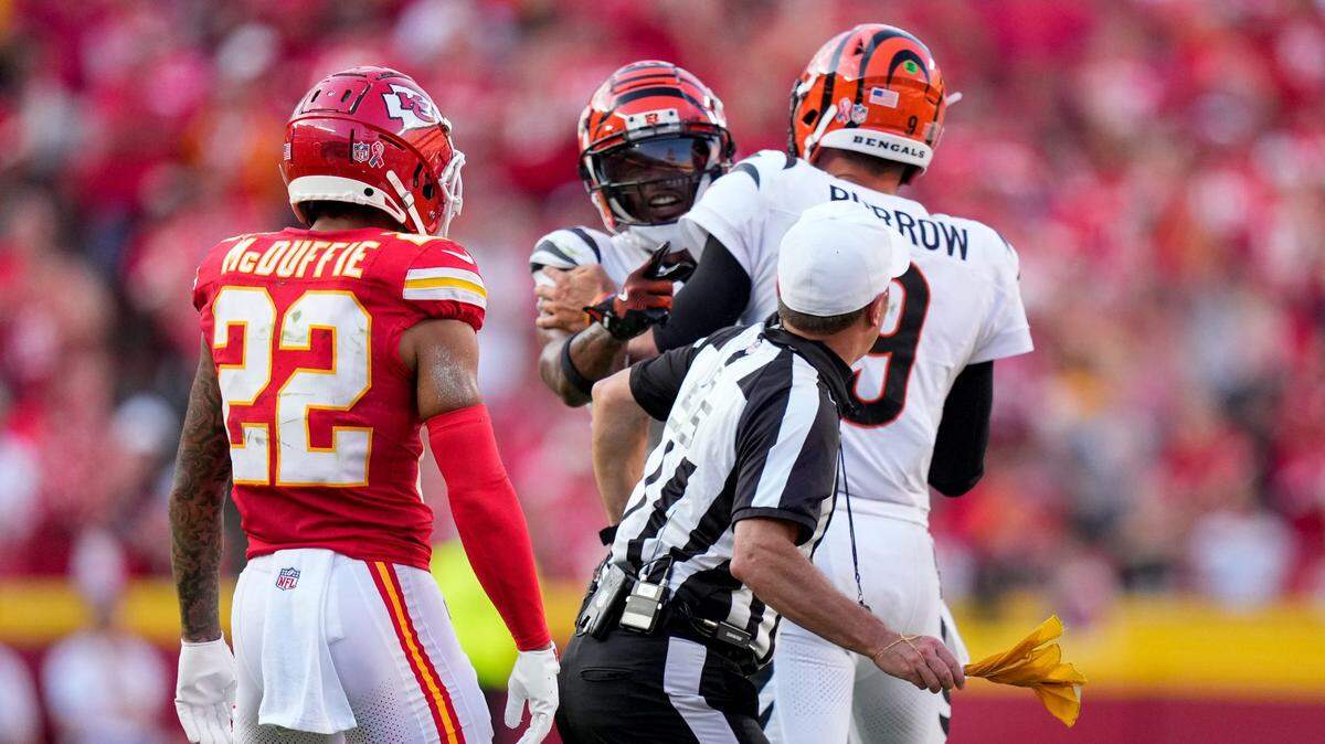 Cincinnati Bengals quarterback Joe Burrow (9) attempts to hold back wide receiver Ja’Marr Chase (1) as he continues to shout at a referee in the fourth quarter of the NFL Week 2 game between the Kansas City Chiefs and the Cincinnati Bengals at Arrowhead Stadium in Kansas City on Sunday, Sept. 15, 2024. The Chiefs won 26-25.