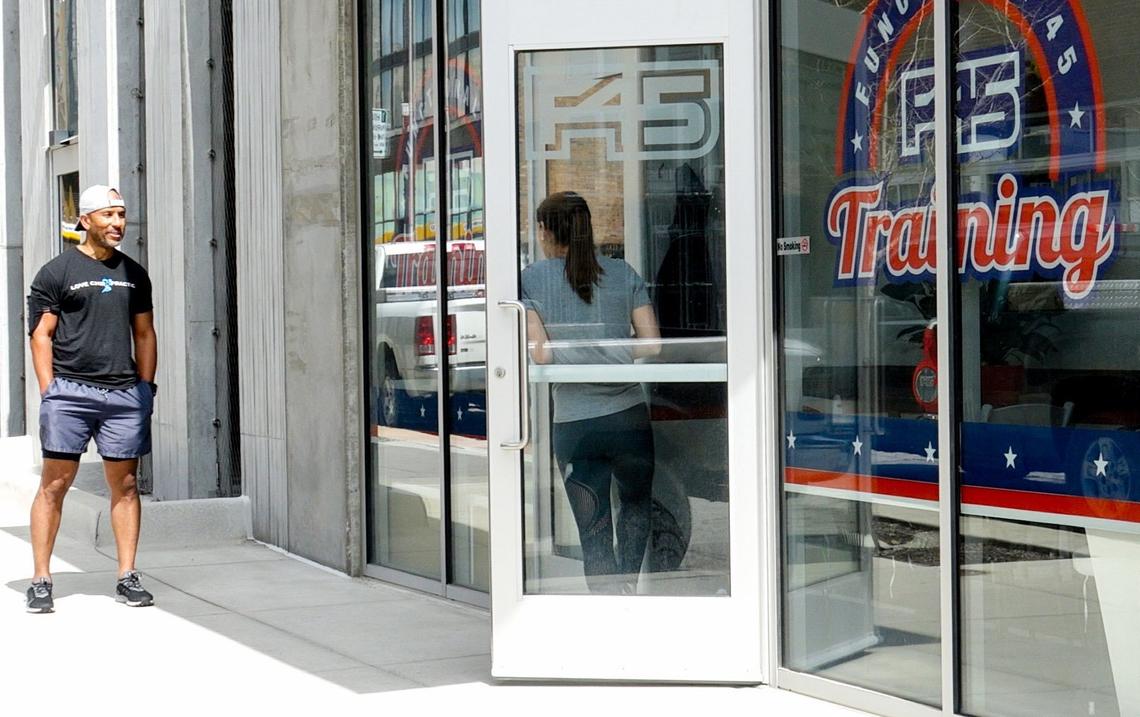 A customer stopped by Thursday while the owners were inside F45 Training, a gym at 1827 Walnut St. in the Crossroads. Gyms are not an essential business under Kansas City’s stay at home order.