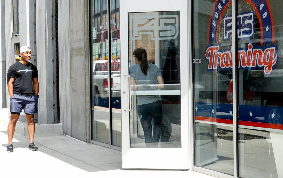 A customer stopped by Thursday while the owners were inside F45 Training, a gym at 1827 Walnut St. in the Crossroads. Gyms are not an essential business under Kansas City’s stay at home order.