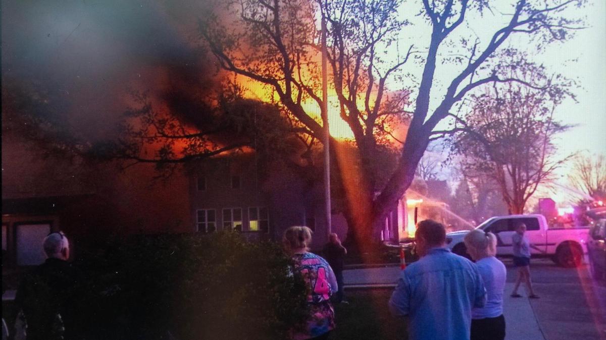 Photo immediately following an April 9 gas line explosion at 17th Street and Franklin Avenue in Lexington, Missouri. Cell photo snapped by Luke Peckham, 14, and shared from the cell phone of his father, Jacob Peckham.