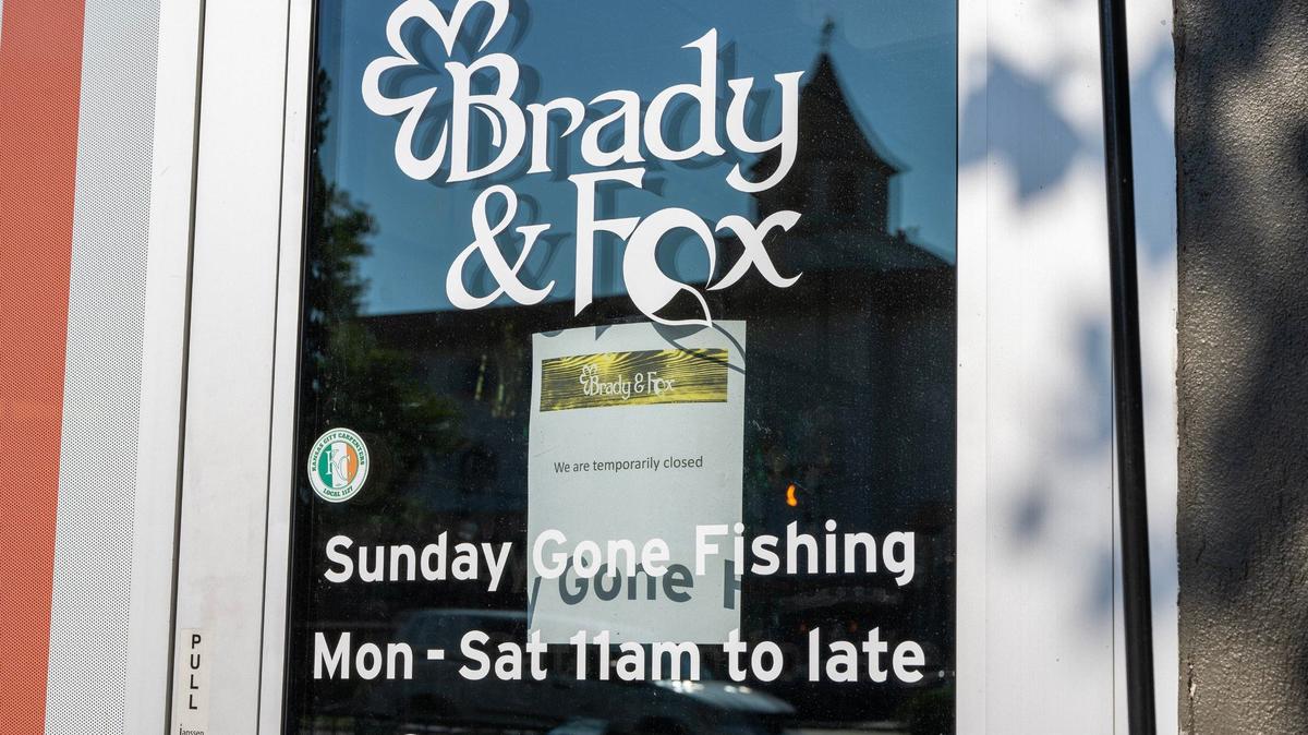 A sign reading “We are temporarily closed” is posted on the door of Brady & Fox on Thursday, Aug. 29, 2024, in Kansas City. The closure follows the death of Shaun Brady, the restaurant’s owner, was shot and killed Wednesday night outside of his restaurant at 63rd Street and Rockhill Road in the Brookside neighborhood.