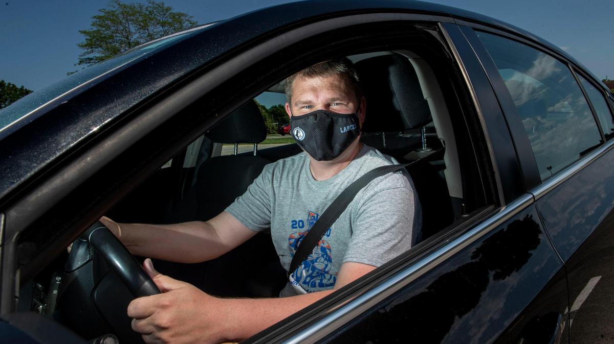 Brett Kramer, who teaches psychology at Shawnee Mission East High School, also works part-time as an Uber driver.