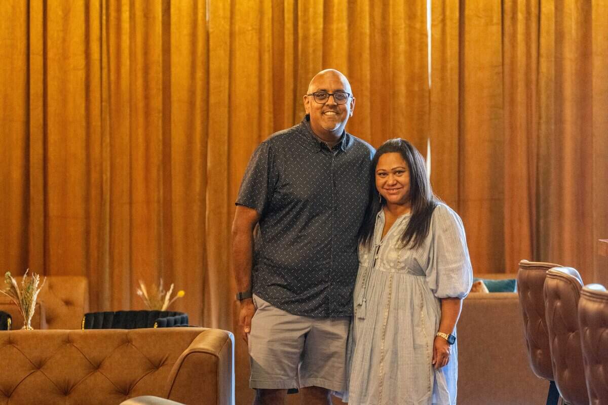 Owners Samir Shura and Dipti Bhakta inside Neat, a new bar concept opening in Lenexa, mixes two of his signature drinks on Thursday, July 9, 2026. The owners started the bar as a place for connections and wanted it to feel like a home.