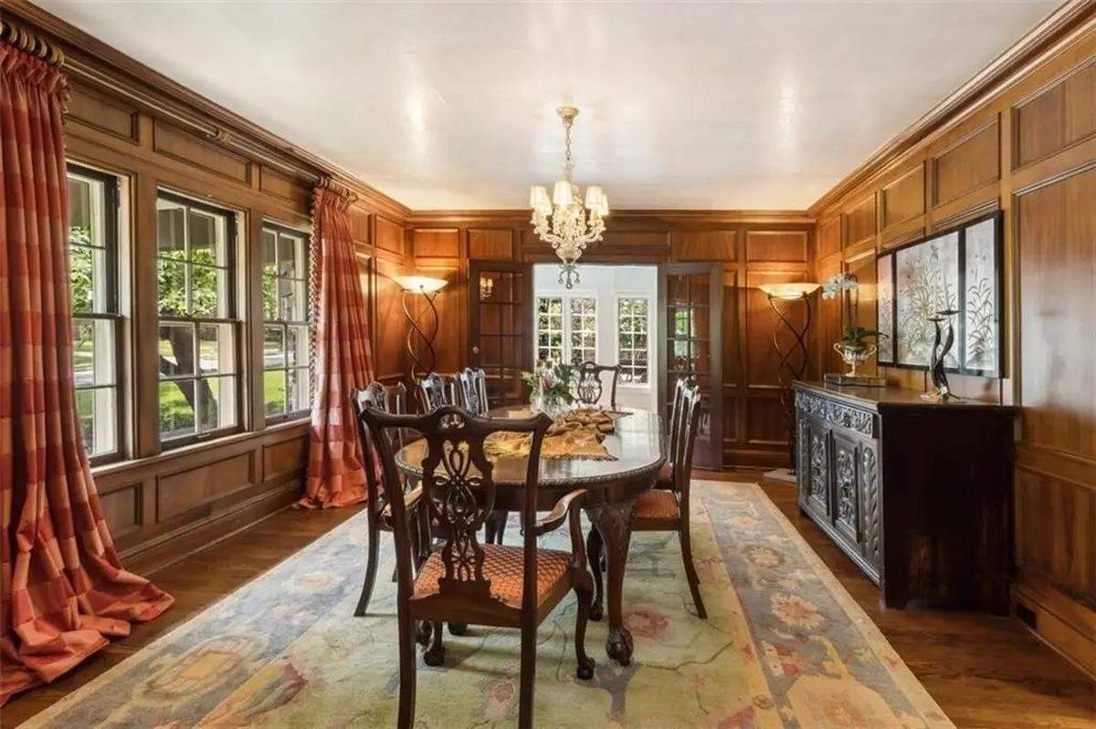 The dining room chandelier is original inside of 434 W. 56th St. Located just south of Loose Park, this Tudor-style home is listed for $1.9 million.