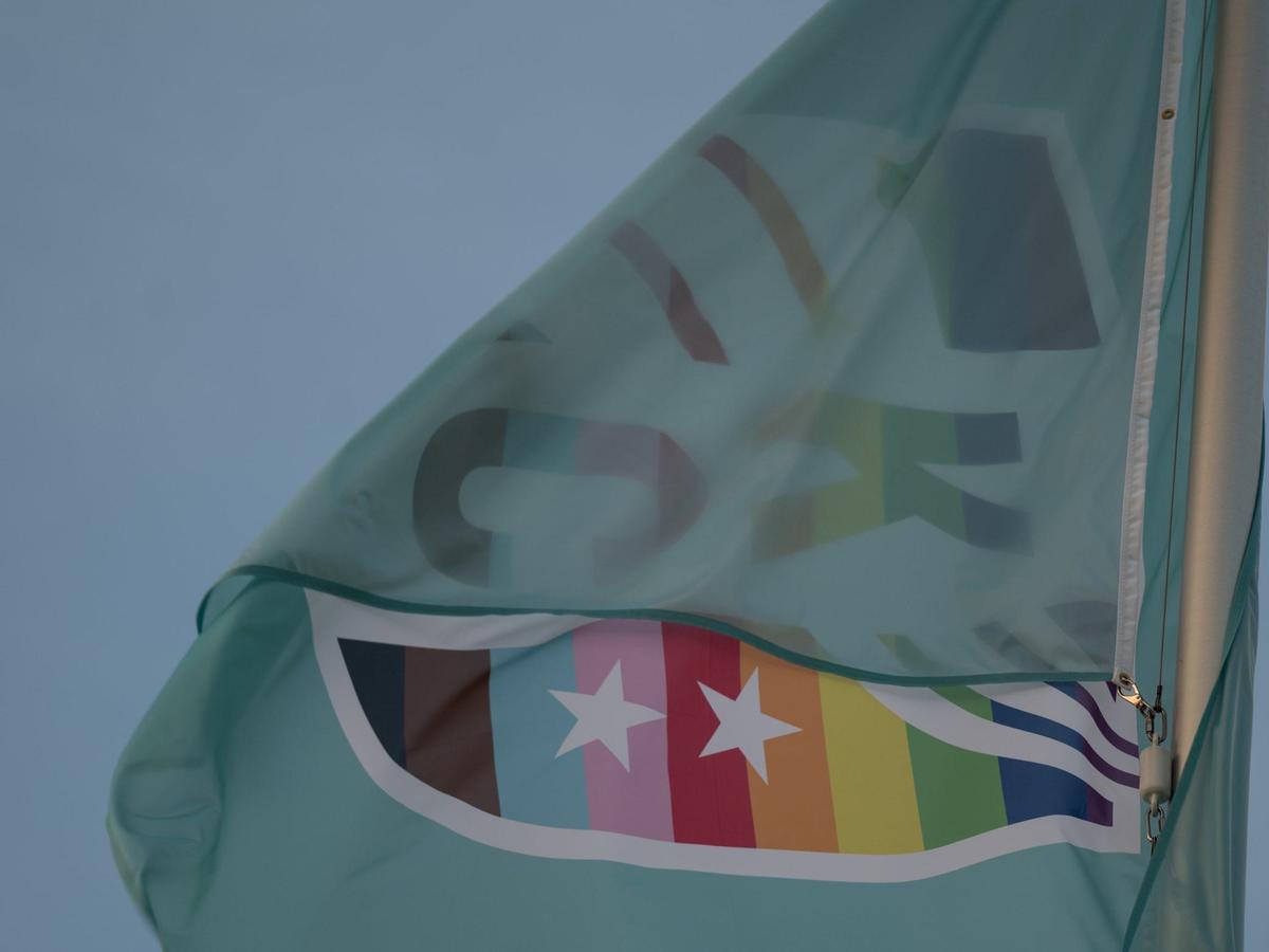 A specially branded Pride logo for the KC Current flies over CPKC Stadium in Kansas City.