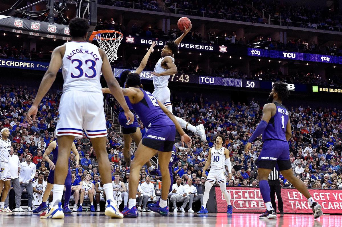 KU’s Ochai Agbaji charged down the lane, grabbed this alley-oop inbounds pass and threw down what had to be the dunk of the Big 12 Tournament over TCU’s Micah Peaby during the second half of Friday’s semifinal game in Kansas City. KU beat TCU, 75-62.