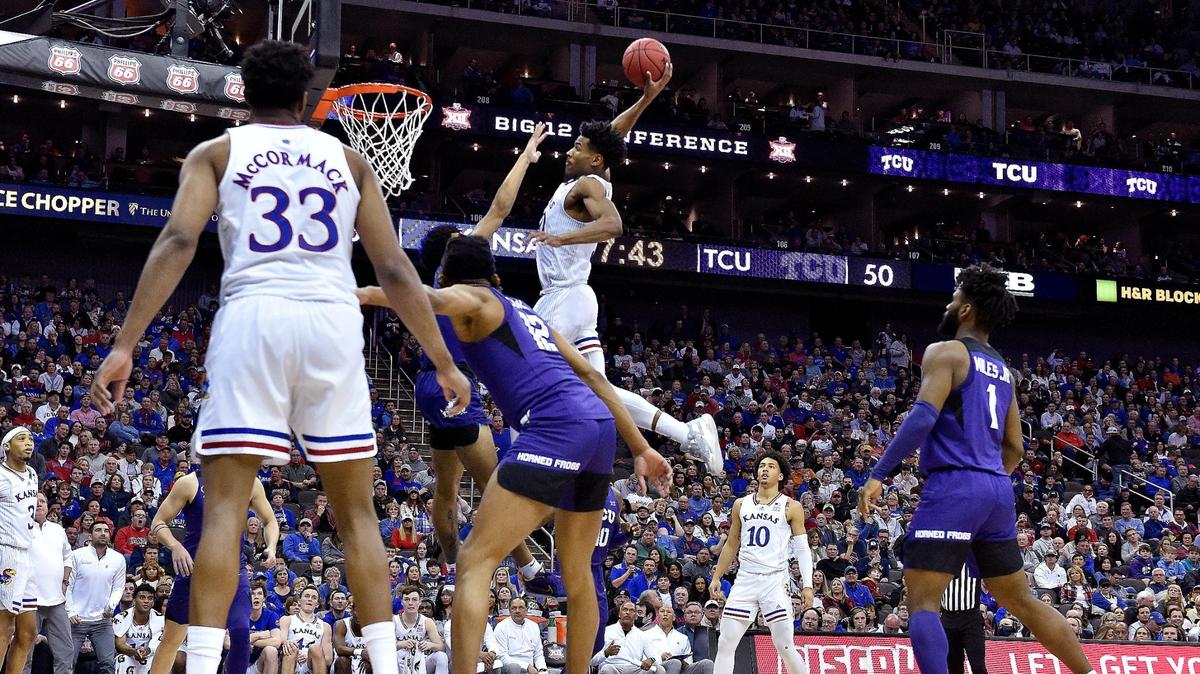 KU’s Ochai Agbaji charged down the lane, grabbed this alley-oop inbounds pass and threw down what had to be the dunk of the tournament over TCU’ s Micah Peaby during the second half of Friday’s semifinal game at the Big 12 Conference Tournament in Kansas City. KU beat TCU, 75-62.