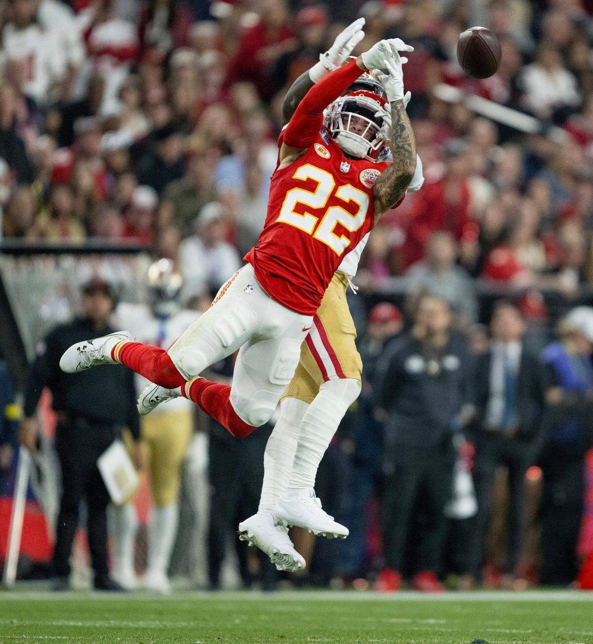 Kansas City Chiefs cornerback Trent McDuffie (22) breaks up a pass intended for San Francisco 49ers wide receiver Deebo Samuel (19) during Super Bowl LVIII on Sunday, Feb. 11, 2024, in Las Vegas.