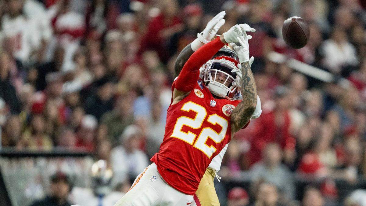 Kansas City Chiefs cornerback Trent McDuffie (22) breaks up a pass intended for San Francisco 49ers wide receiver Deebo Samuel (19) during Super Bowl LVIII on Sunday, Feb. 11, 2024, in Las Vegas.