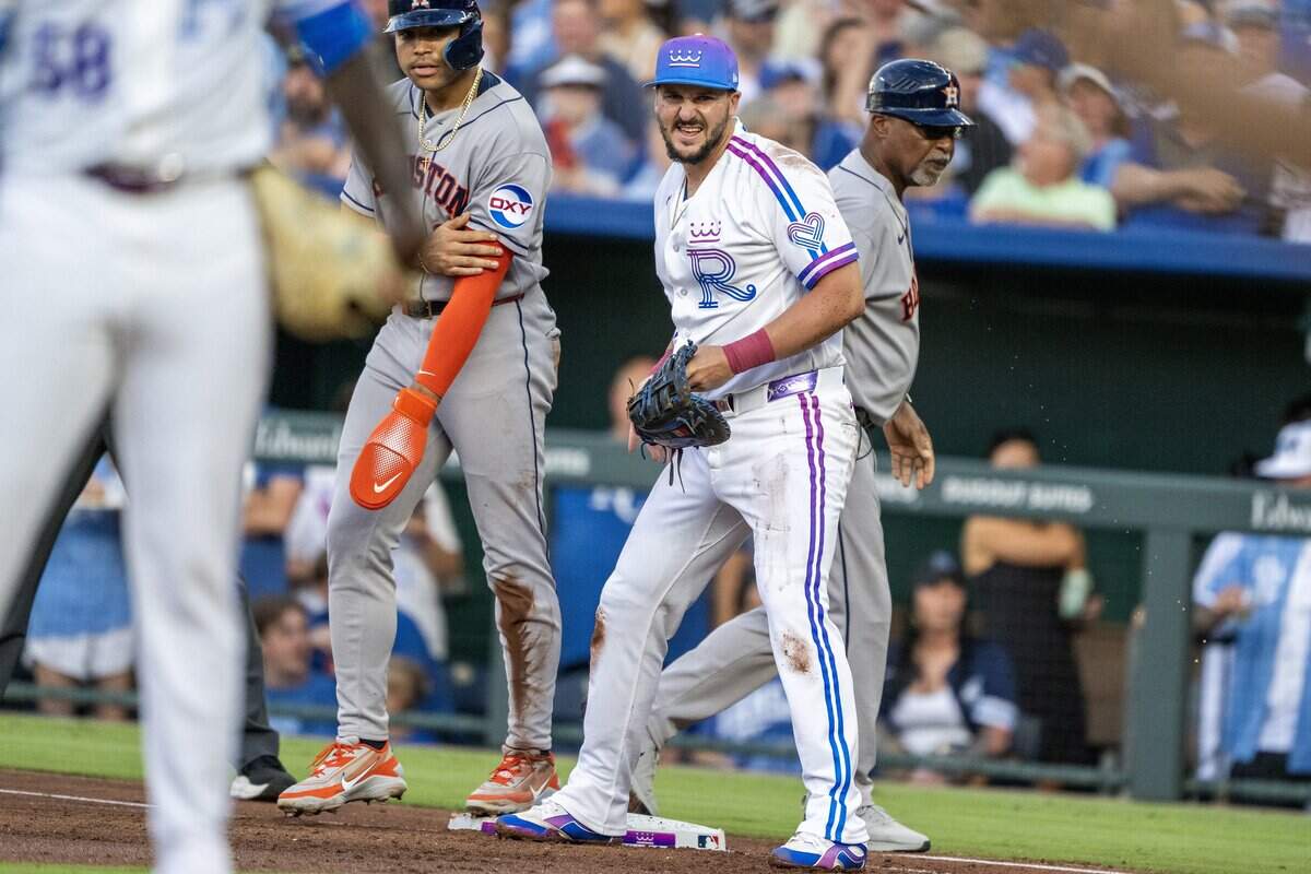 Wearing the Kansas City Royals' new "Forever Fountains" City Connect uniform, first baseman Vinnie Pasquantino (9) watches a play in the first inning against the Houston Astros on Friday, June 12, 2026, at Kauffman Stadium in Kansas City.