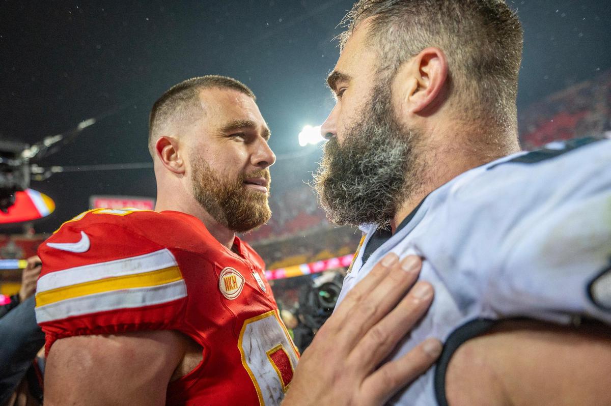 Kansas City Chiefs tight end Travis Kelce (87) and bother Philadelphia Eagles center Jason Kelce (62) meet after the Philadelphia Eagles defeated the Chiefs at GEHA Field at Arrowhead Stadium on Monday, Nov. 20, 2023, in Kansas City.