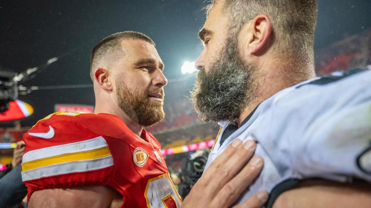 Kansas City Chiefs tight end Travis Kelce (87) and bother Philadelphia Eagles center Jason Kelce (62) meet after the Philadelphia Eagles defeated the Chiefs at GEHA Field at Arrowhead Stadium on Monday, Nov. 20, 2023, in Kansas City.