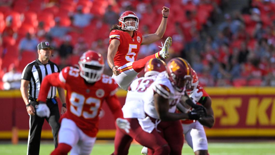 Kansas City Chiefs punter Tommy Townsend (5) follows through and watches the ball sail against the Washington Commanders in the fourth quarter on Saturday, Aug. 20, 2022, at Arrowhead Stadium in Kansas City. The Chiefs defeated the Commanders, 24-17.